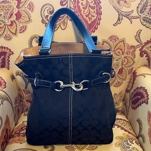 EUC RARE vintage bucket bag Coach Black and tan. Silver hardware, footed bottom.